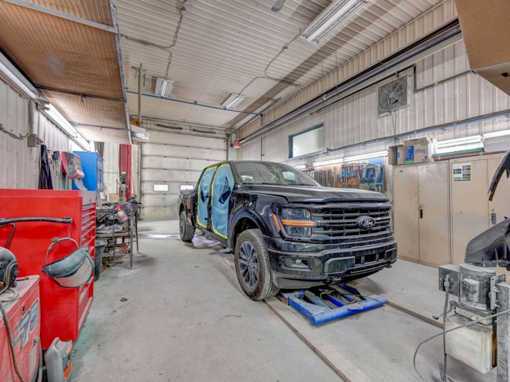 Automotive bodywork / paint garage with industrial building